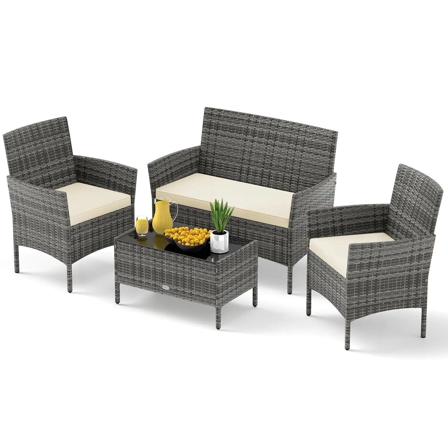 Rattan Outdoor 4-Piece Patio Set With Cushions And Glass Coffee Table
