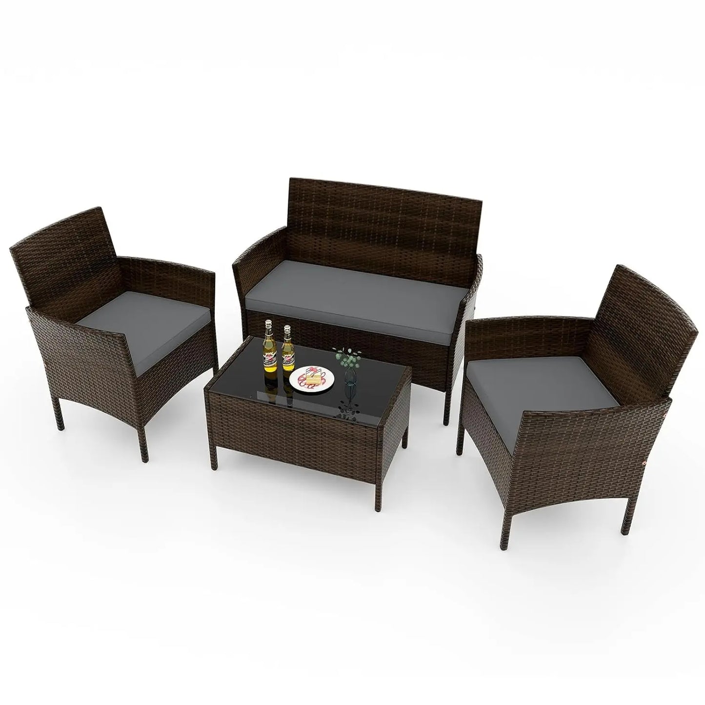 Rattan Outdoor 4-Piece Patio Set With Cushions And Glass Coffee Table